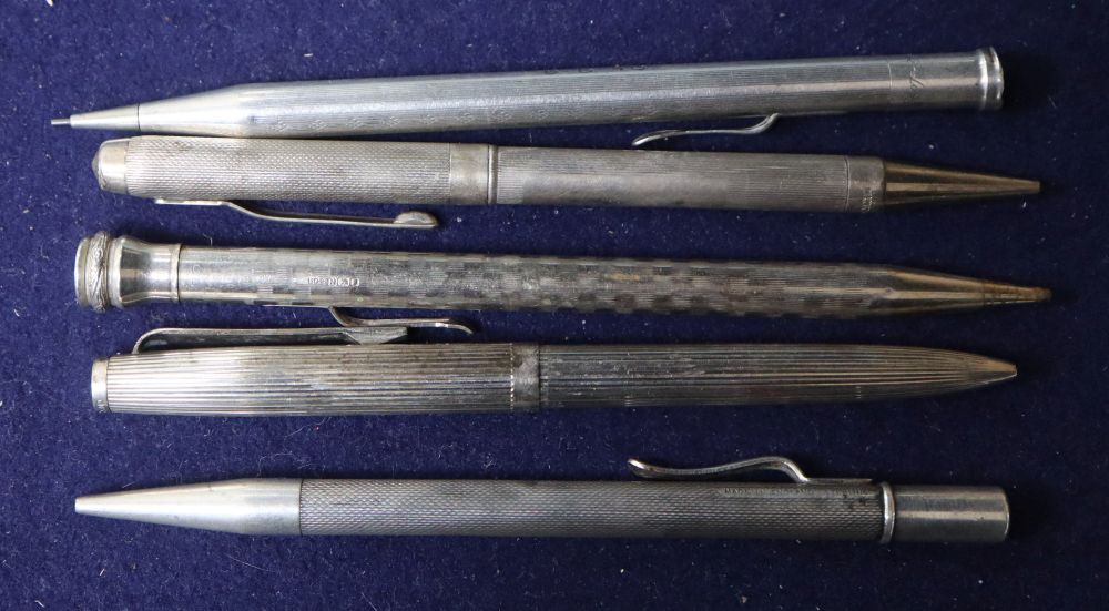 Five silver pencils